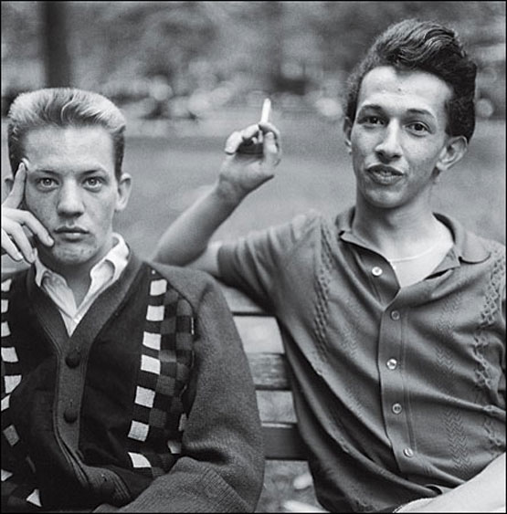 Two Young Men On A Bench