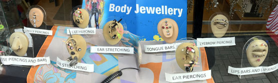 Body Jewellery In Soho Shop Window - click for enlarged image in all its excruciating detail